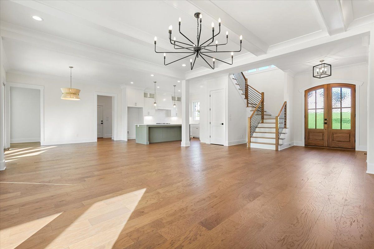 Empty living room with chandelier