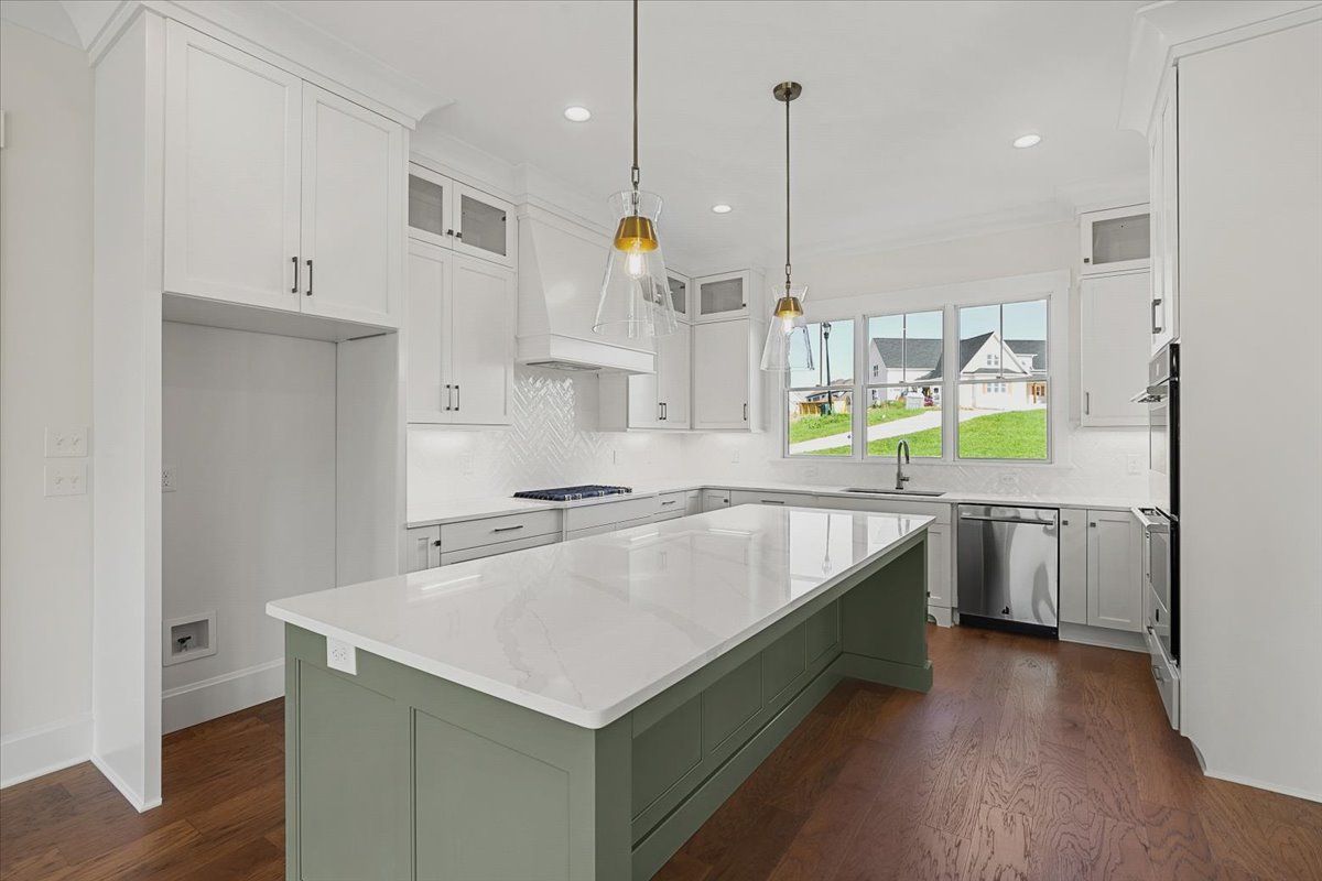 Clean kitchen with large island
