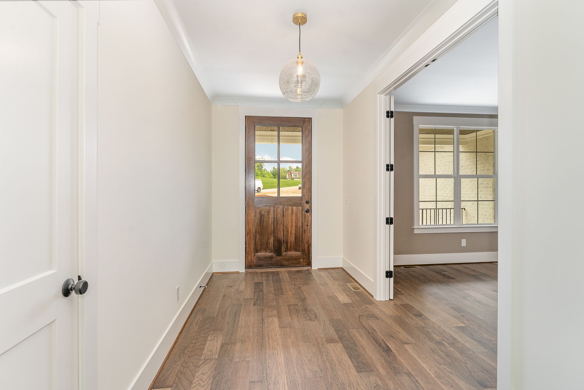 A hallway with hardwood floors