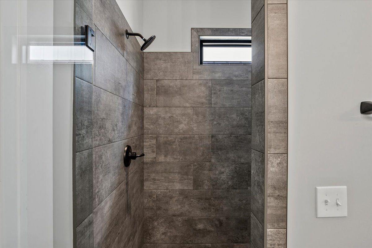 Walk-in shower with open glass door