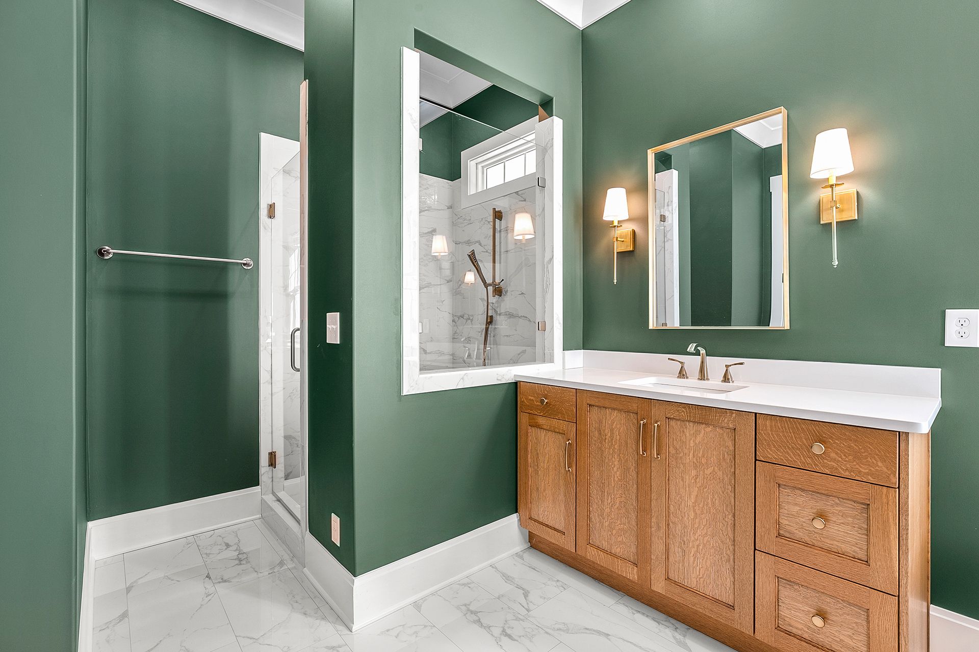 A bathroom with green walls