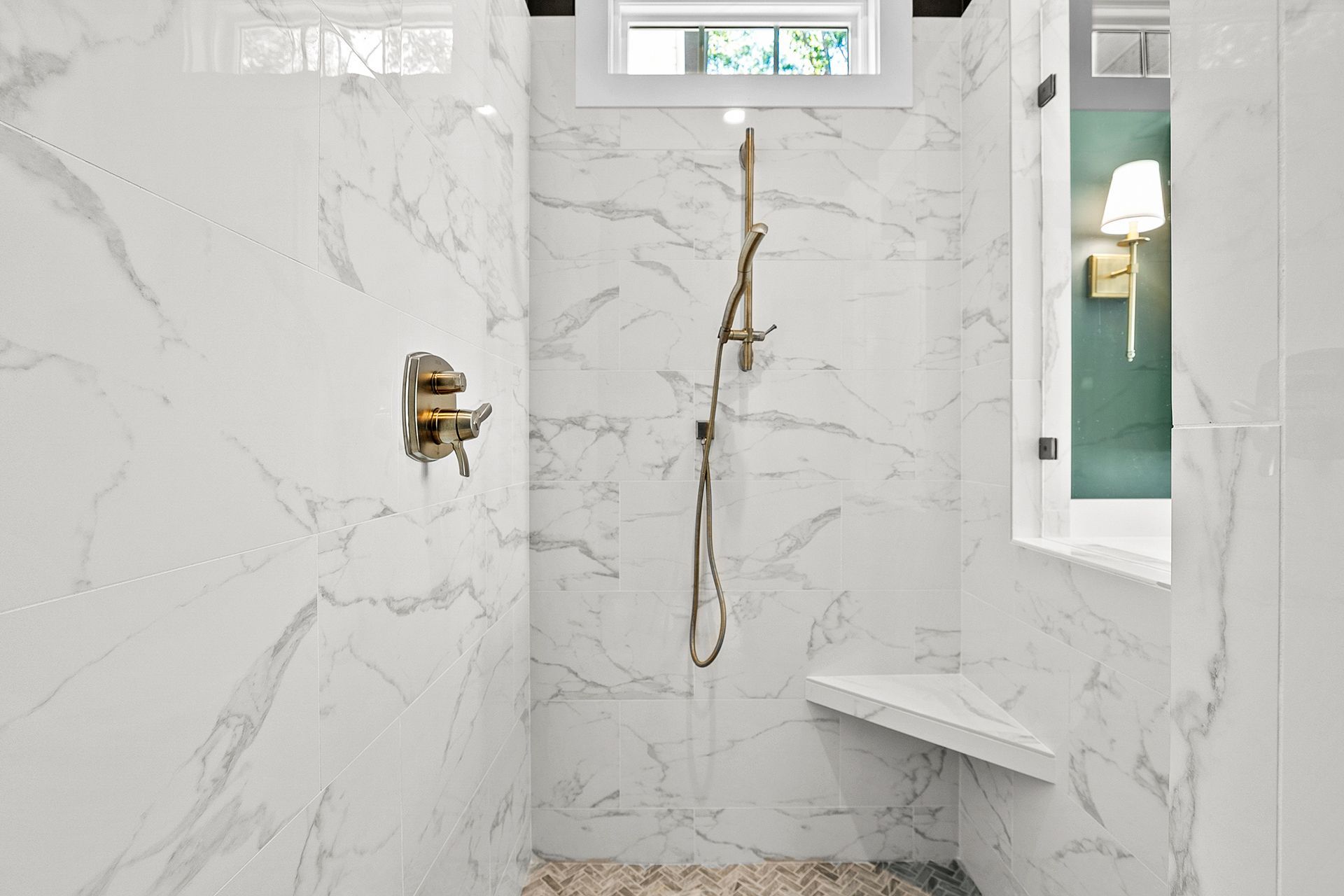A bathroom with marble walls