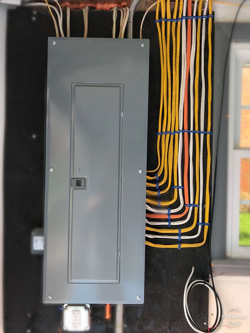 An electrical box with a bunch of wires coming out of it