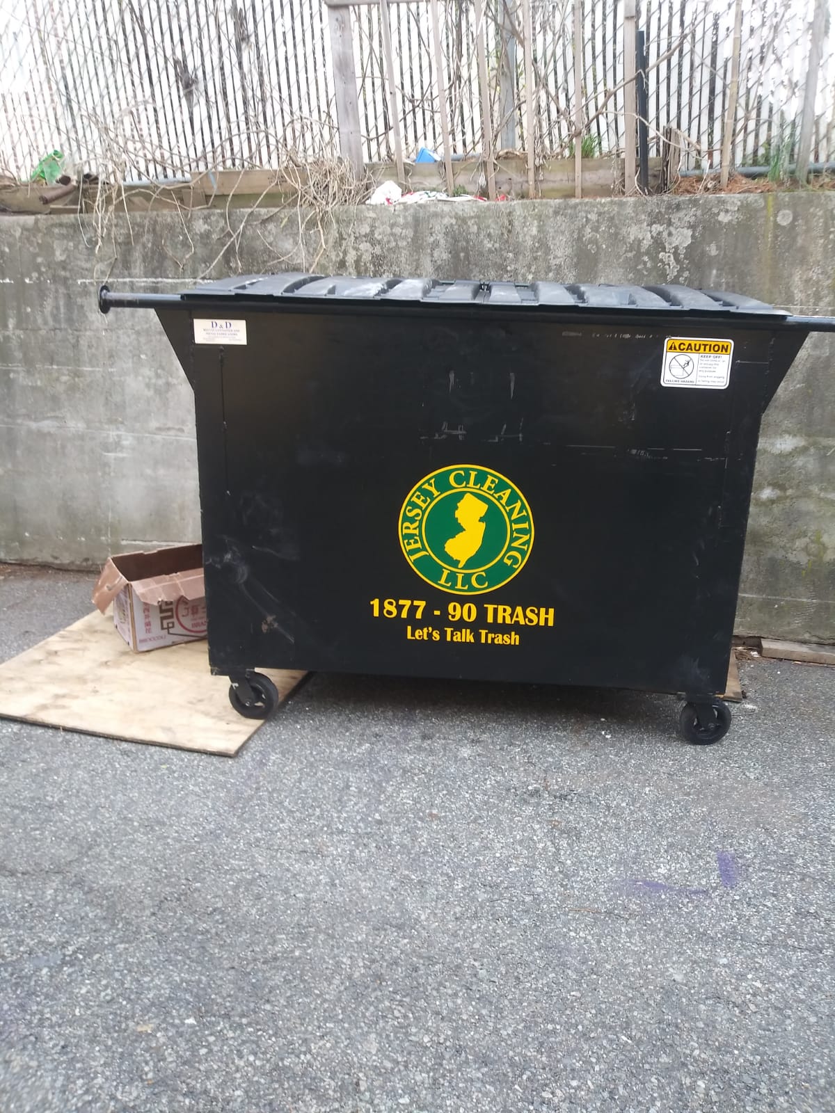 Black Jersey Cleaning dumpster 