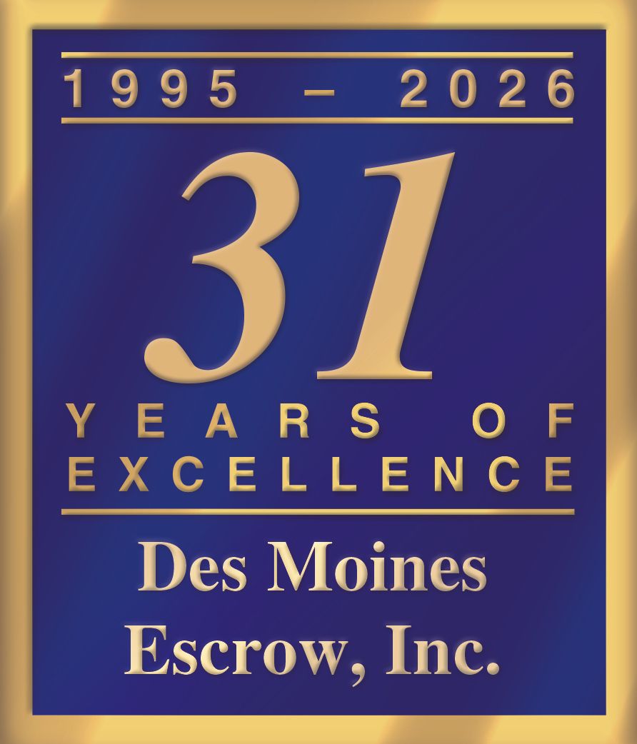 A blue and gold anniversary emblem for Des Moines Escrow, Inc., stating 31 years of excellence from 1995 to 2026.