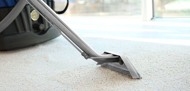 Heated preconditioning carpet cleaning