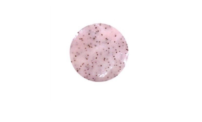 A pink circle with black dots on it on a white background.