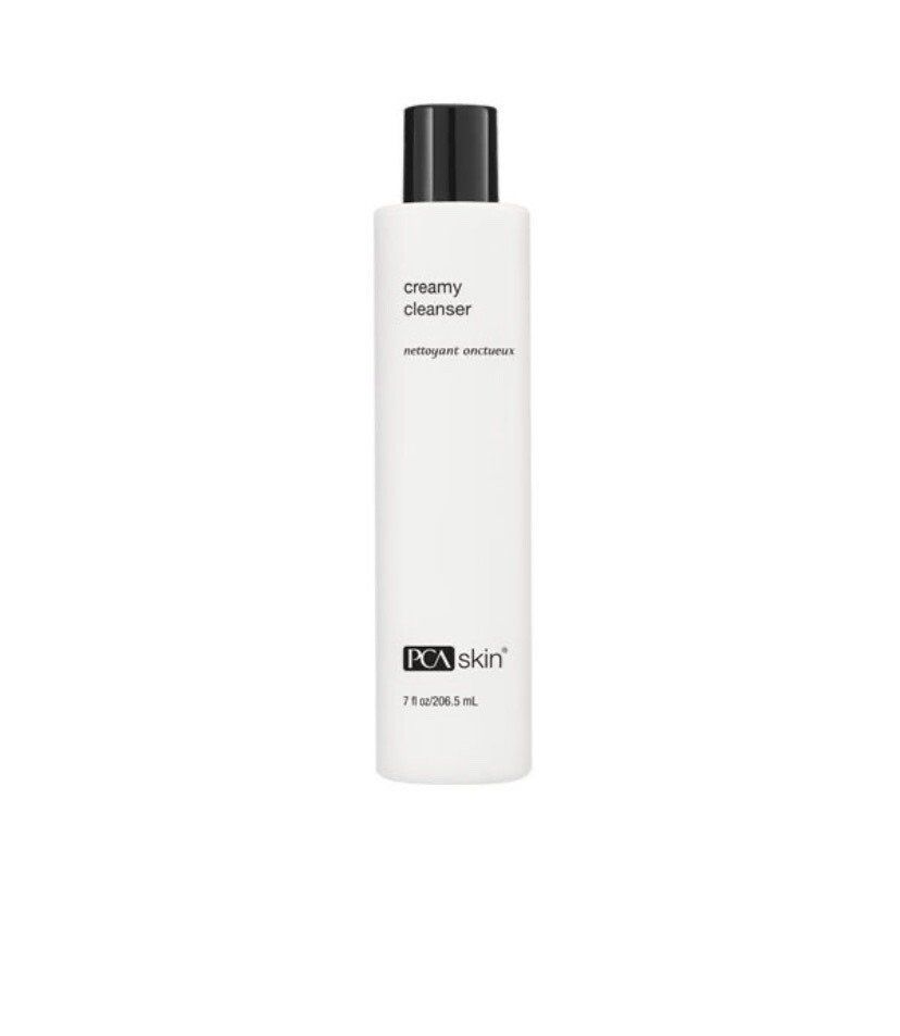 A bottle of pca skin creamy cleanser on a white background