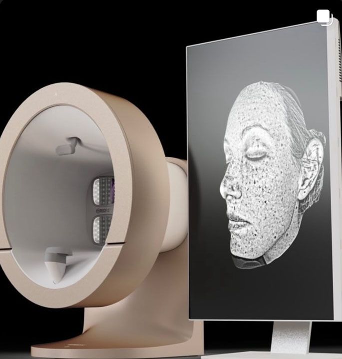 A picture of a woman 's face is displayed next to a machine