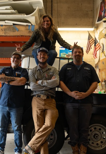 Office crew in front of a jetter