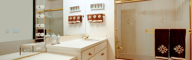 classy shower enclosures with golden accents