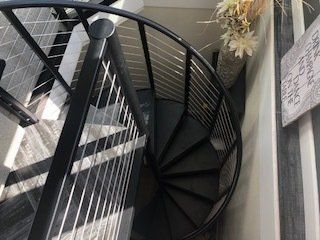 Spiral staircase railing