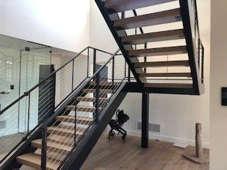 Black railings on staircase