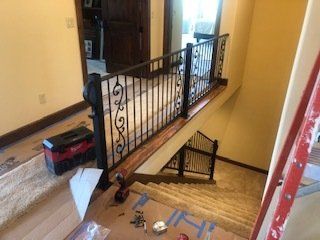 Custom black railings on staircase