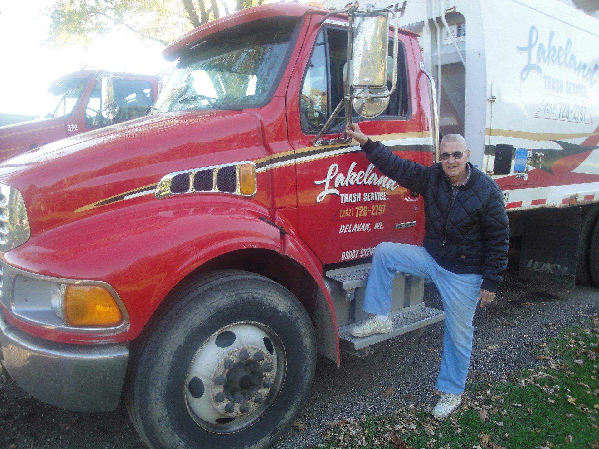 Man with a red truck