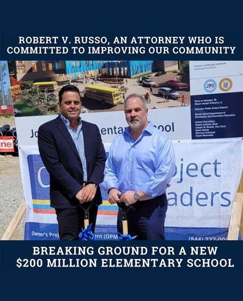 Two men at groundbreaking for a $200 million elementary school. One holds a shovel. Text: Robert V. Russo.