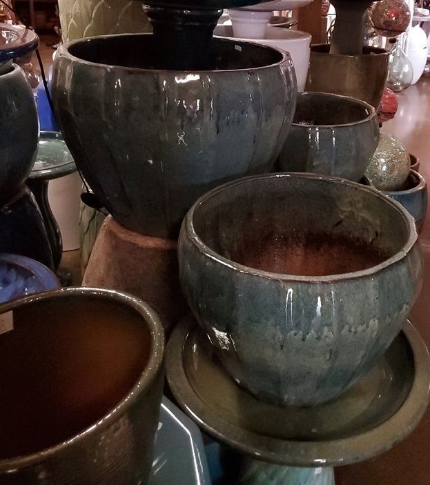 A bunch of pots are stacked on top of each other