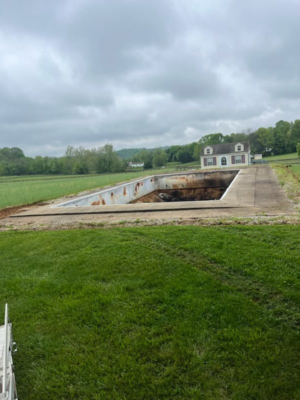 Old pool being removed