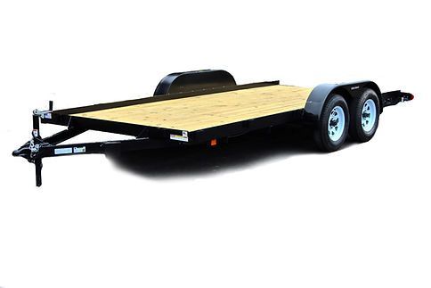 Black dual-axle flatbed trailer with a wood deck and silver wheels on a white background
