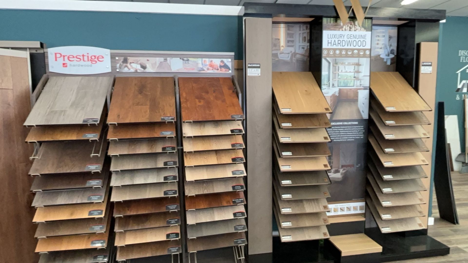 A display of different types of wooden flooring in a store.