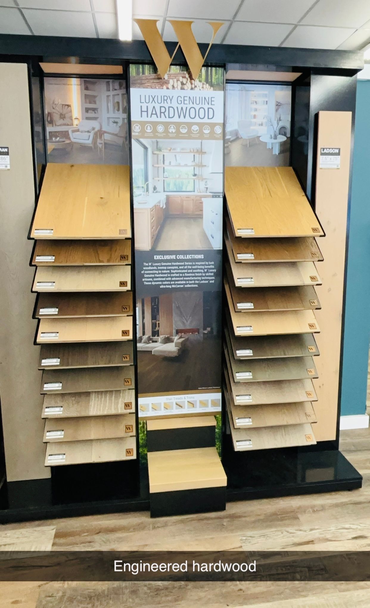 A display of different types of wood flooring in a store.