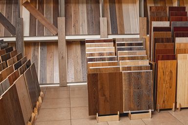 A room filled with lots of different types of wooden flooring.