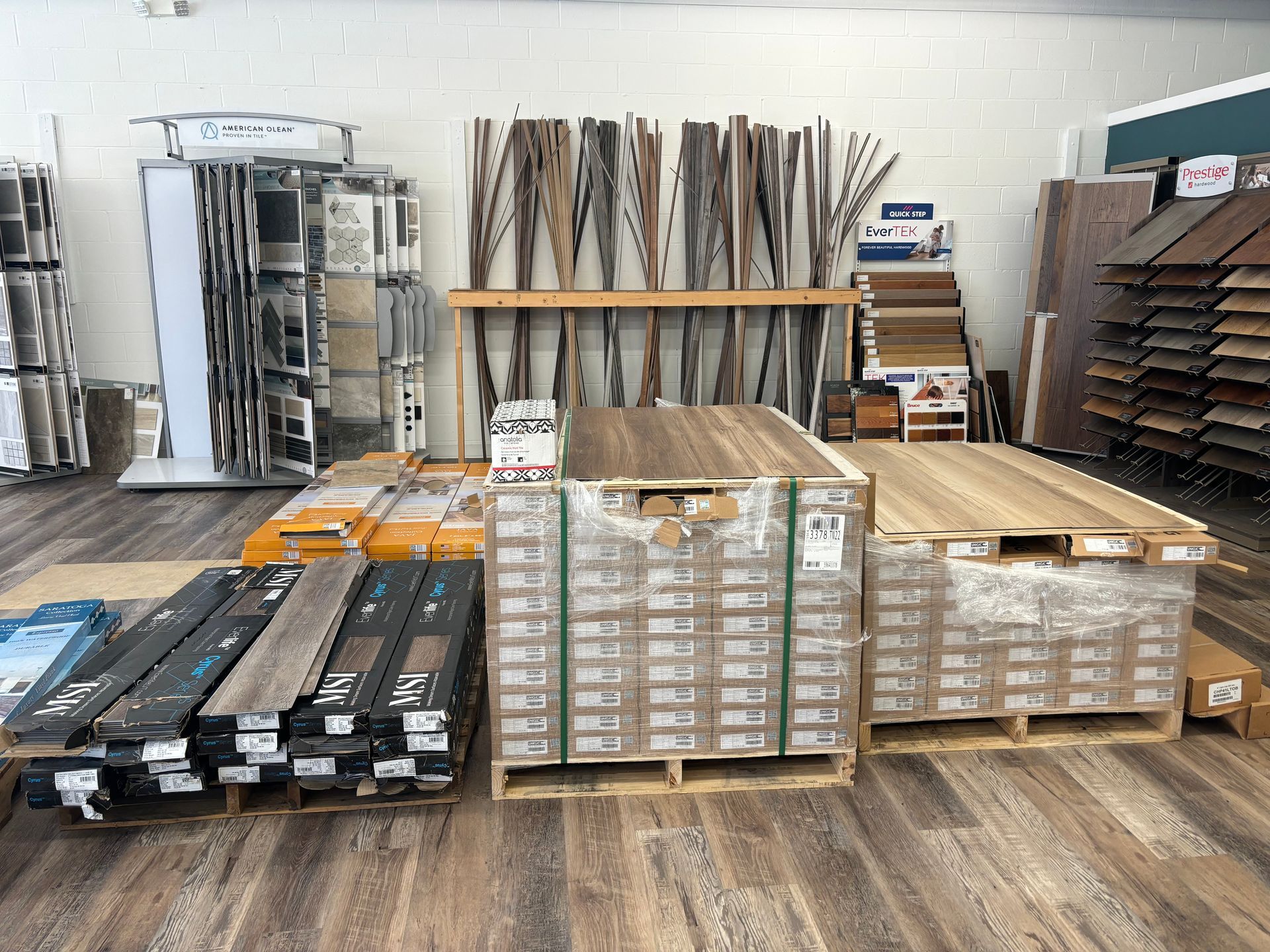 A warehouse filled with lots of wooden flooring.