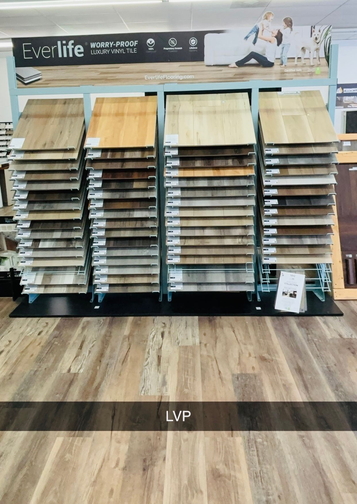 A display of different types of flooring in a store.