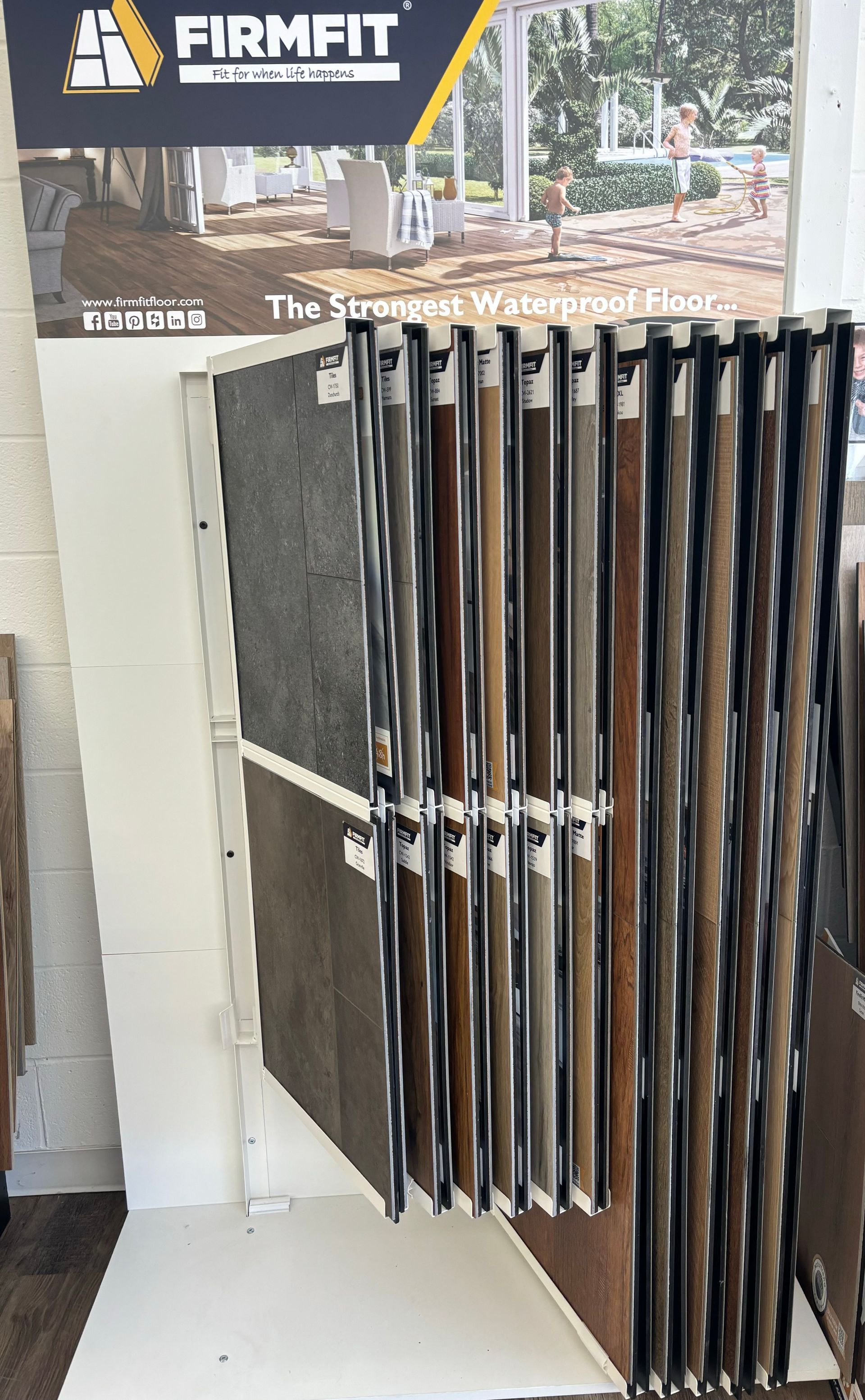A display of firmfit tiles in a store.