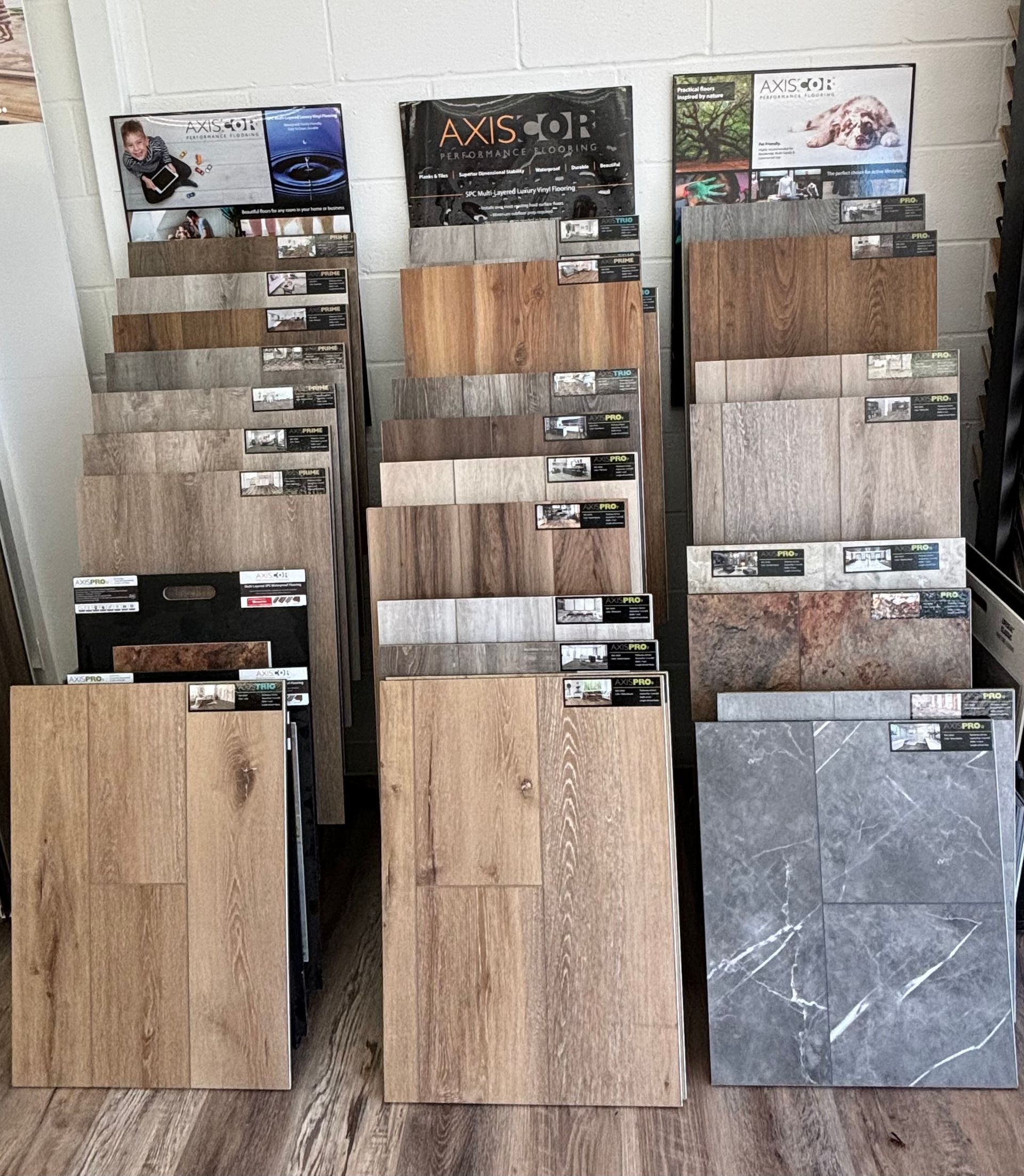 A display of different types of flooring in a store.
