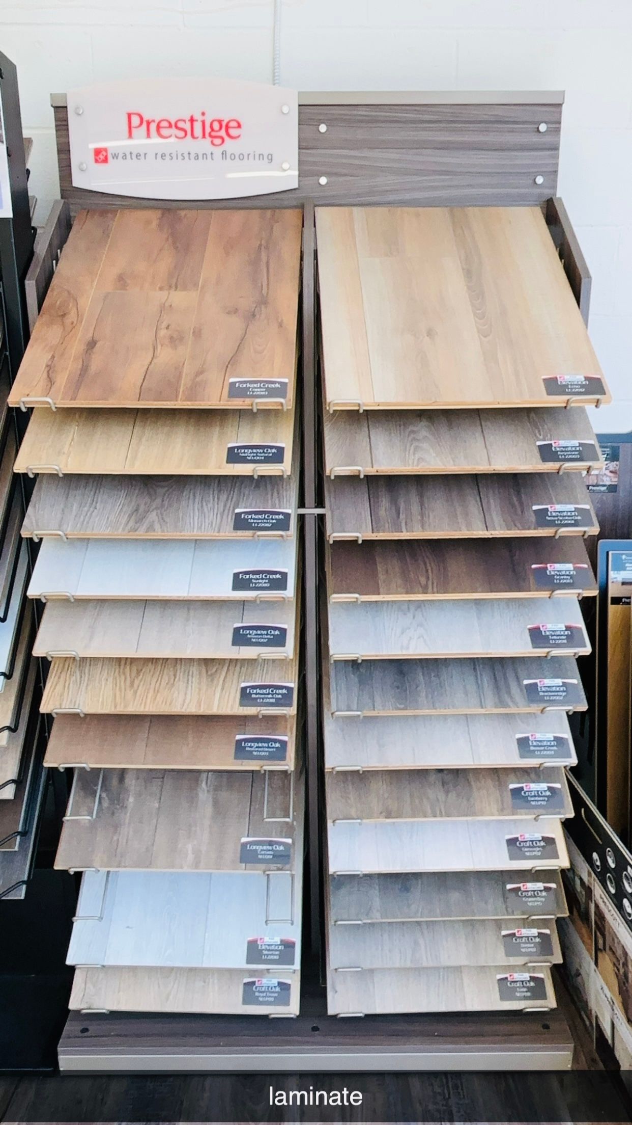 A display of different types of flooring in a store.