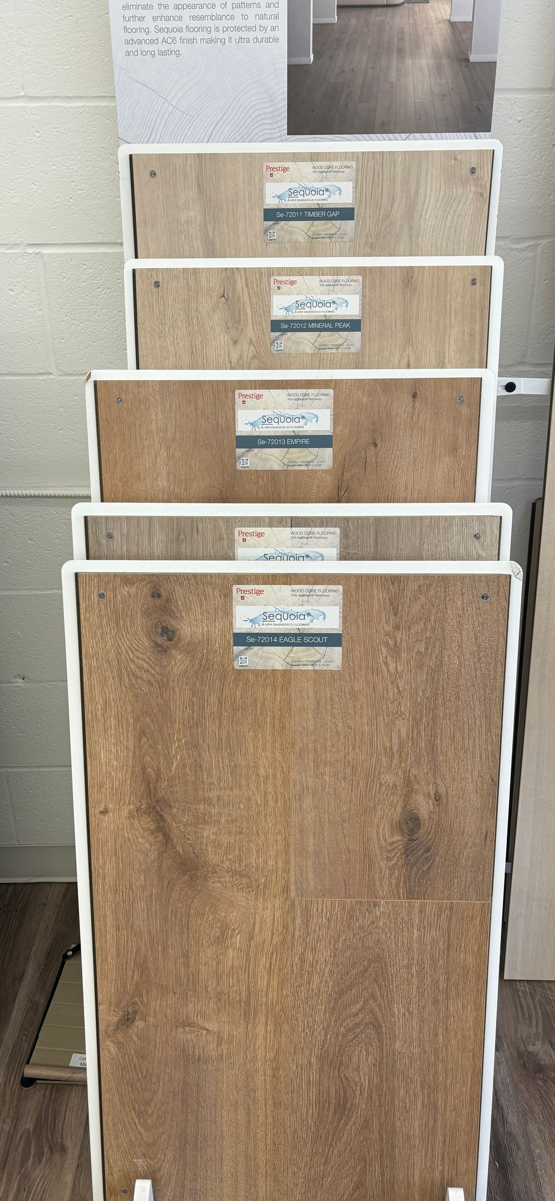 A stack of wooden boxes sitting on top of each other in a room.