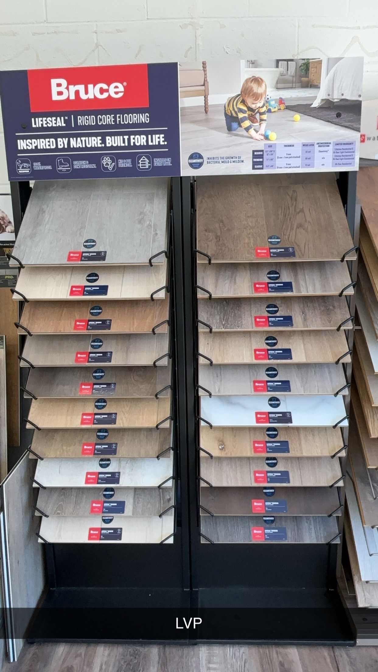 A display of different types of flooring in a store.