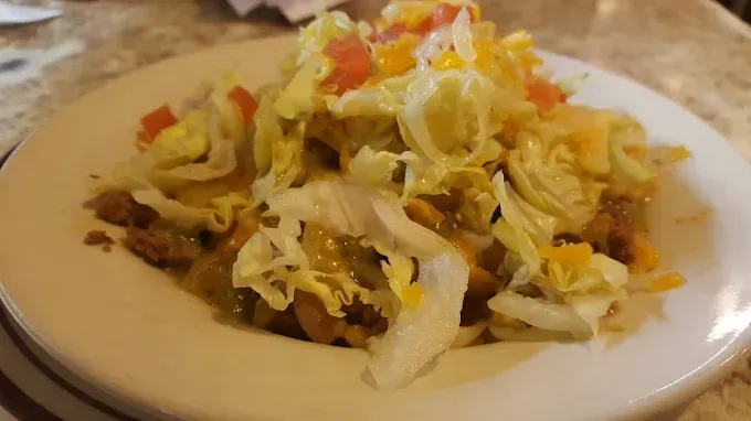 A close up of a plate of food on a table.