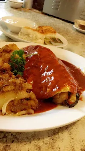 A close up of a plate of food on a table.