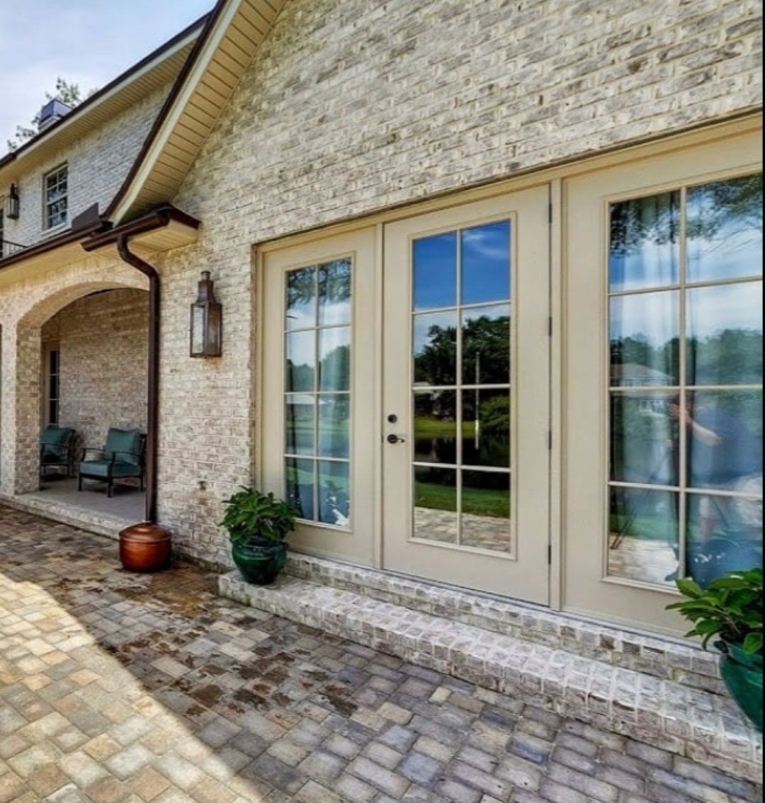 A house with a lot of windows and doors