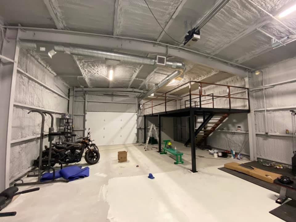 There is a motorcycle parked in the middle of the room.