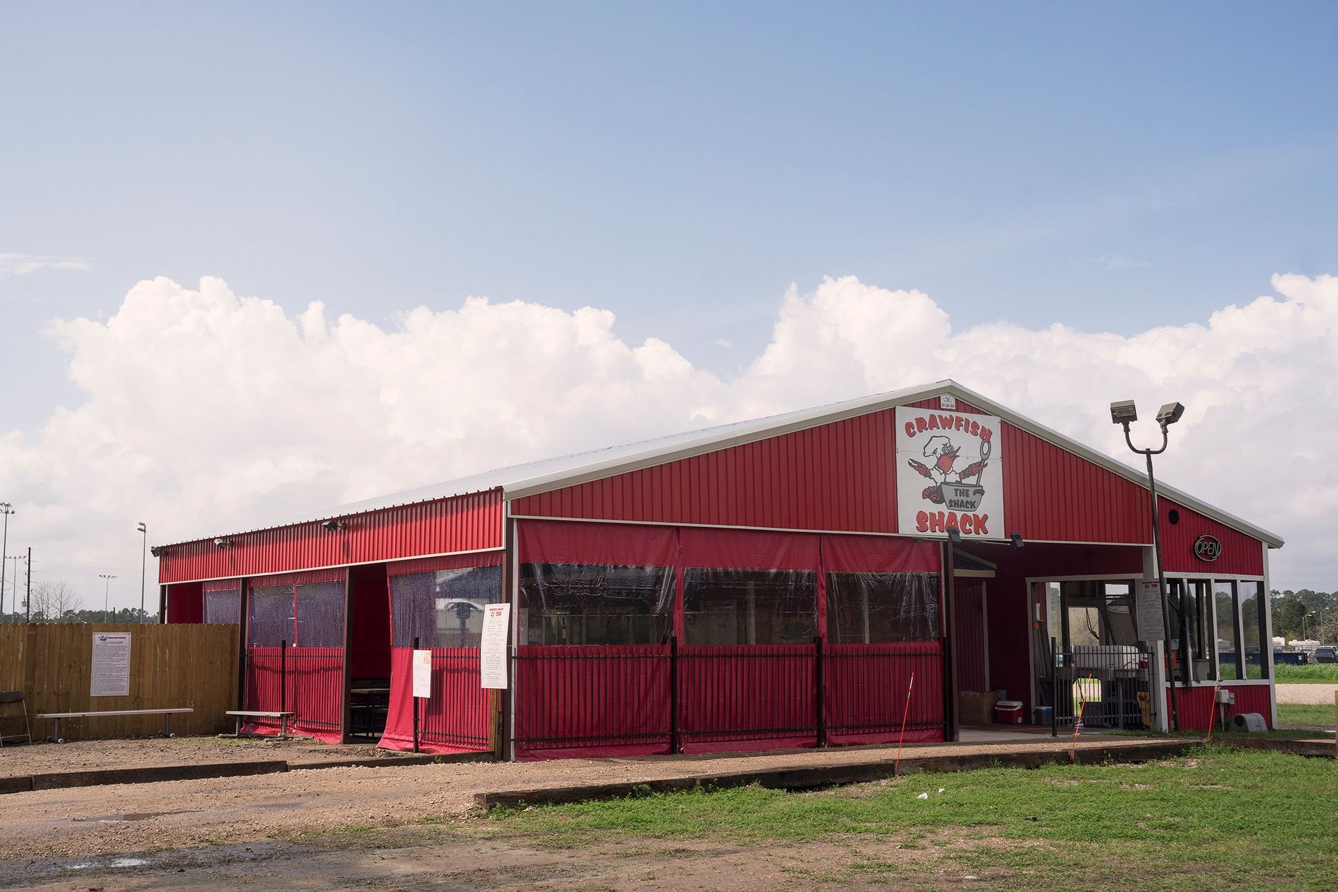 A red building with a white roof.