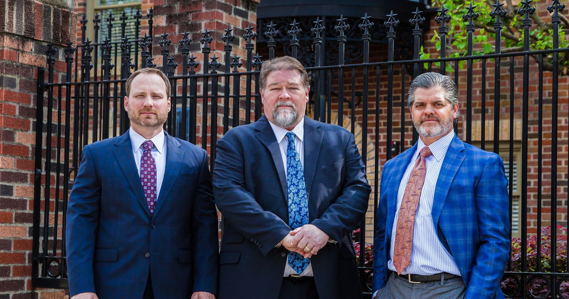 Attorneys Jason Parrish, Gregory Waldron and David Moore