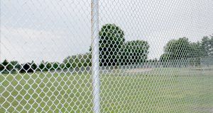 Chain link fence around the field