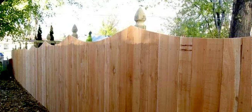 Wooden fence with arcs
