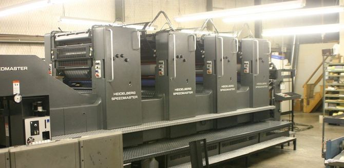 Four color printing press
