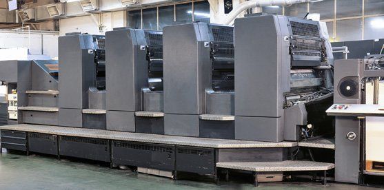 Four color printing press