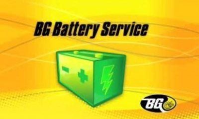 An ad for bg battery service shows a green battery on a yellow background