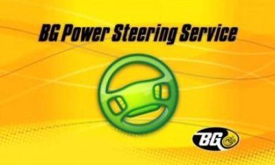 An advertisement for bg power steering service with a green steering wheel on a yellow background