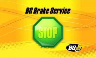 A green stop sign is on a yellow background