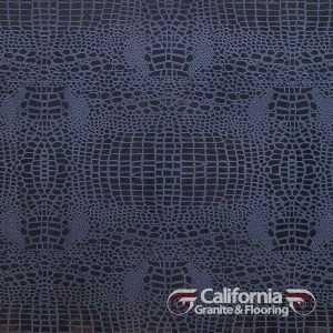 Dark blue crocodile-patterned flooring, with the California Granite & Flooring logo in the bottom right corner.