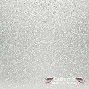 White embossed floral tile pattern.