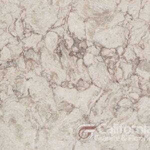 Beige quartz countertop with gray veining and California Granite & Floors watermark.