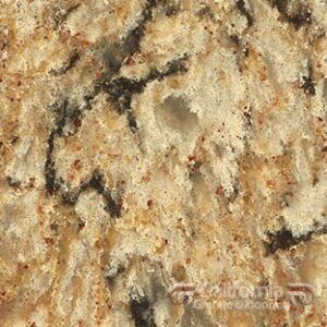 Close-up of granite countertop with beige, brown, and black veining and speckles.